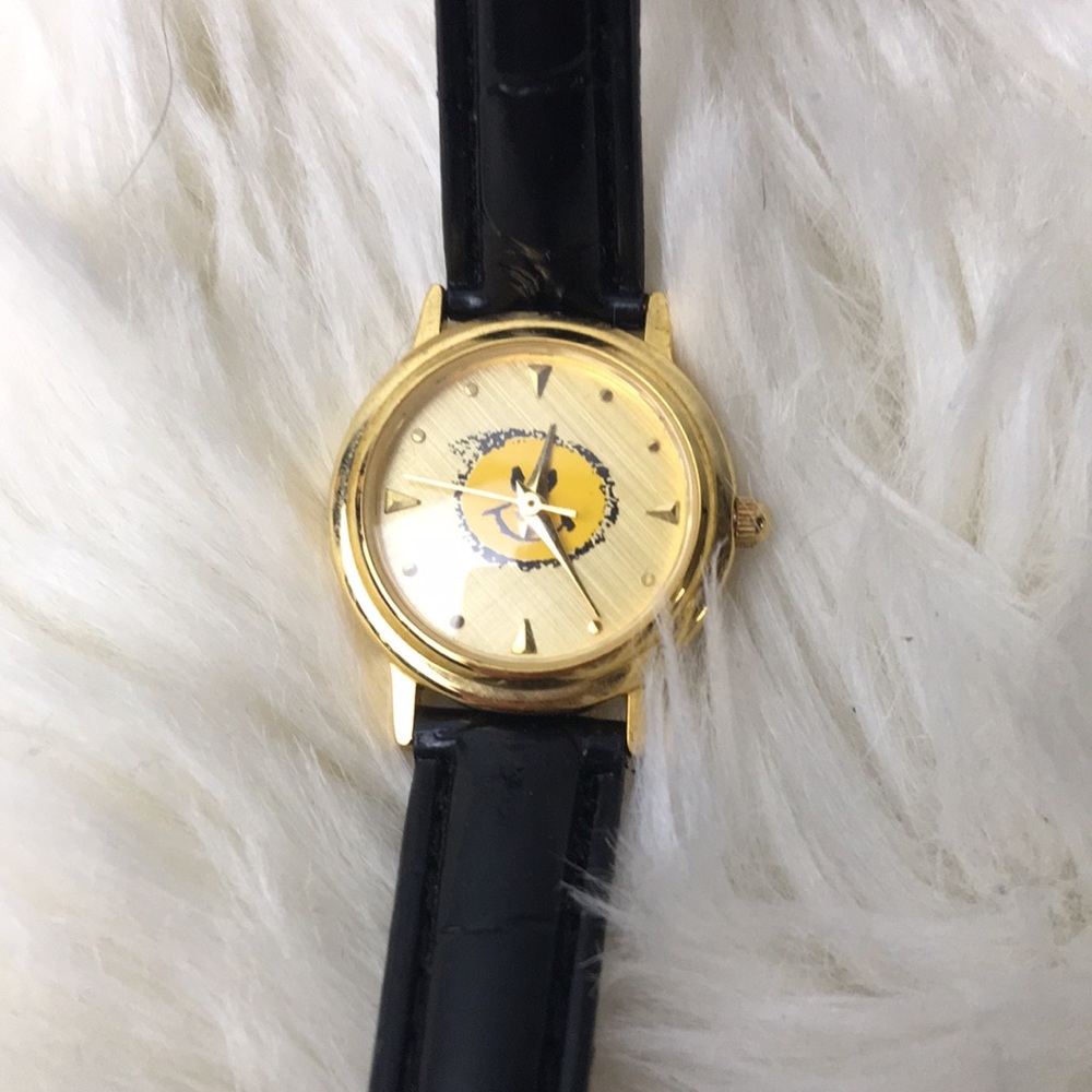 Ladies gold tone smiley face wrist watch